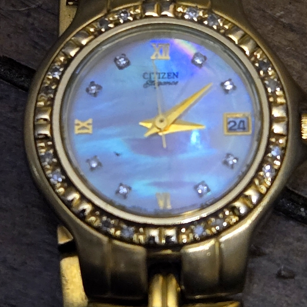 Citizen Gold Timepiece with Iridescent Dial